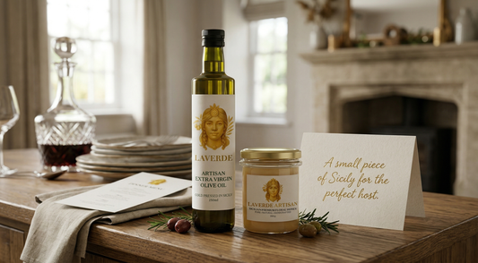 Artisan Sicilian olive oil and raw honey gift set elegantly wrapped as a host gift — UK 2026 guide to the art of premium artisan gifting for hosts