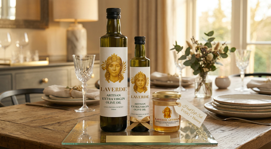 Multiple gourmet food gift options arranged on a wooden table — UK 2026 buyer's guide to the gourmet presents every host actually wants to receive