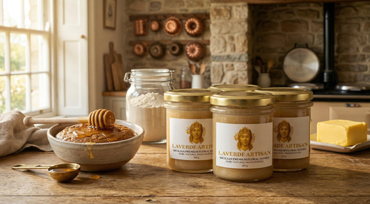 Raw Sicilian honey poured into a baking bowl alongside refined sugar — UK comparison guide on which sweetener actually tastes better in baking applications