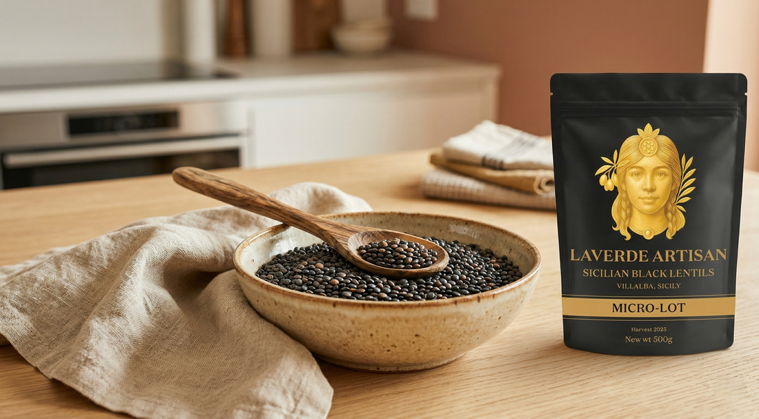 Heritage Villalba black lentils in a kraft paper bag with cooking ingredients on a wooden surface — UK 2026 complete online sourcing guide for foodies