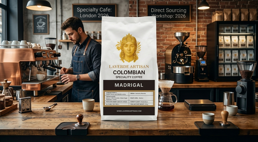 Artisan barista serving specialty coffee in a London cafe — UK 2026 guide to specialty cafés vs buying coffee direct for home brewing
