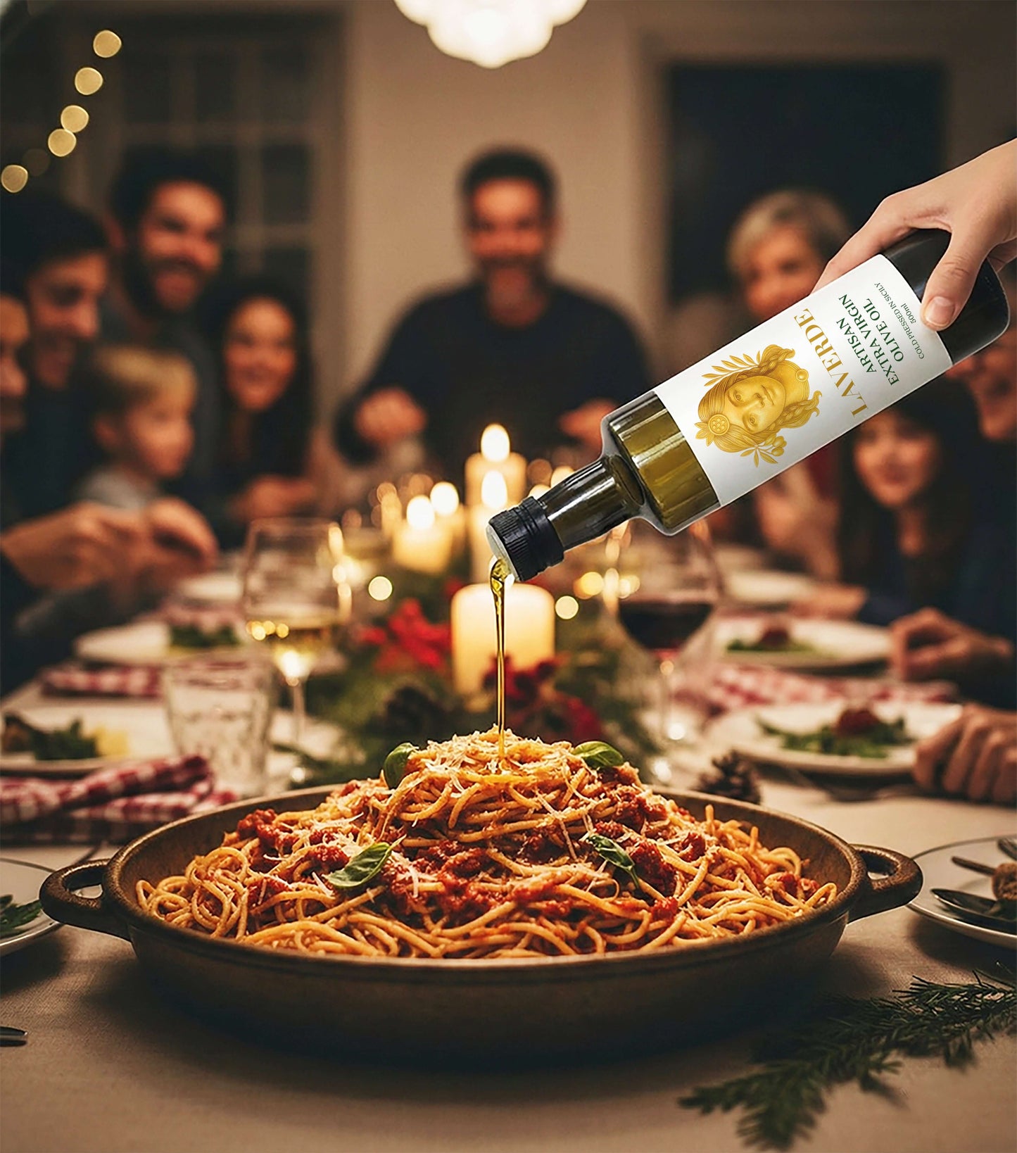 Sicilian Extra Virgin Olive Oil 500ml poured over pasta — Laverde Artisan cold-pressed Sicilian EVOO with a happy family in the background enjoying a festive meal.