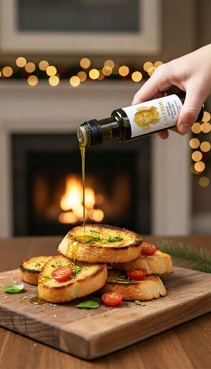 Mini Extra Virgin Olive Oil 100ml used at Christmas dinner — Laverde Artisan Sicilian cold-pressed EVOO drizzled over toasted bread with tomatoes, ideal for festive cooking and gourmet holiday meals.